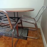 2 chrome wired chairs