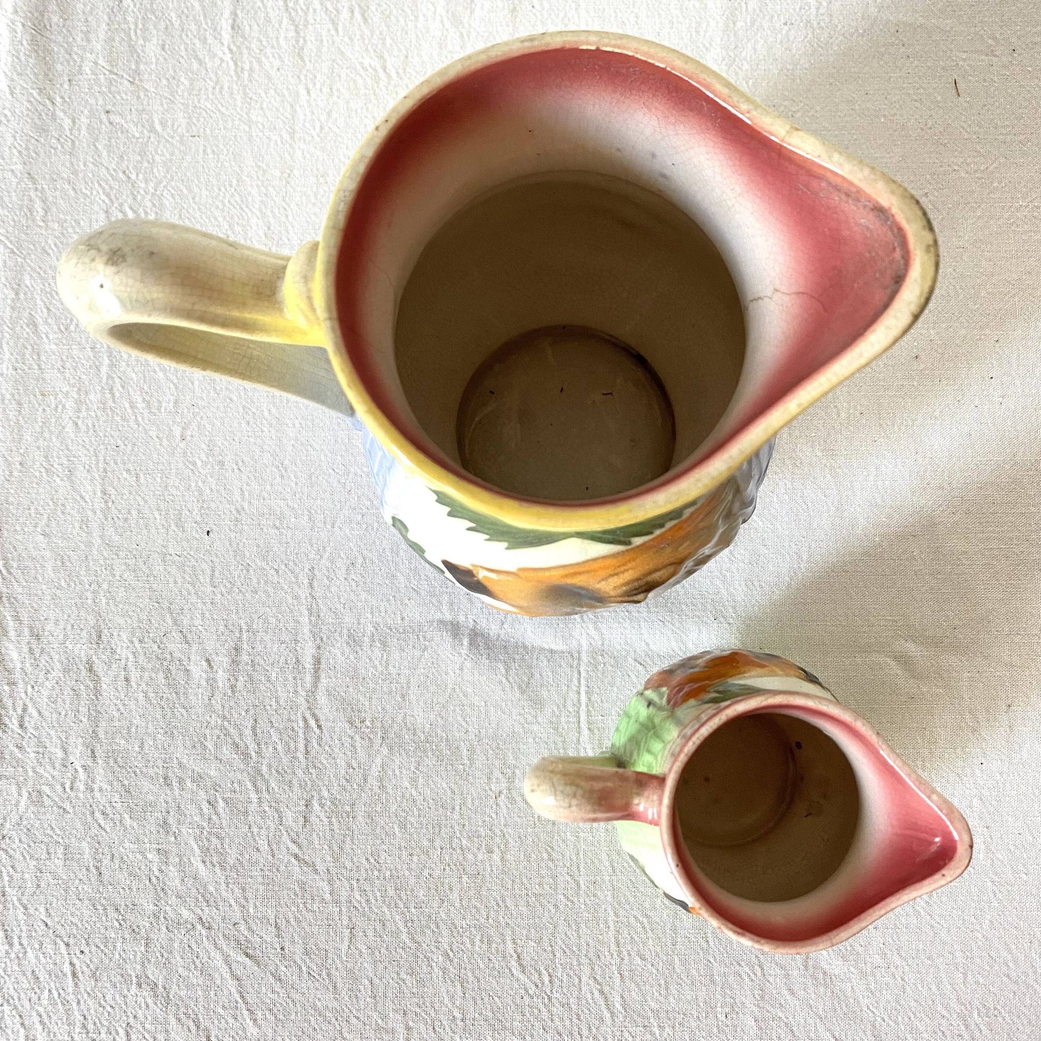 Art Deco pitchers in assorted barbotine lion Poët Laval