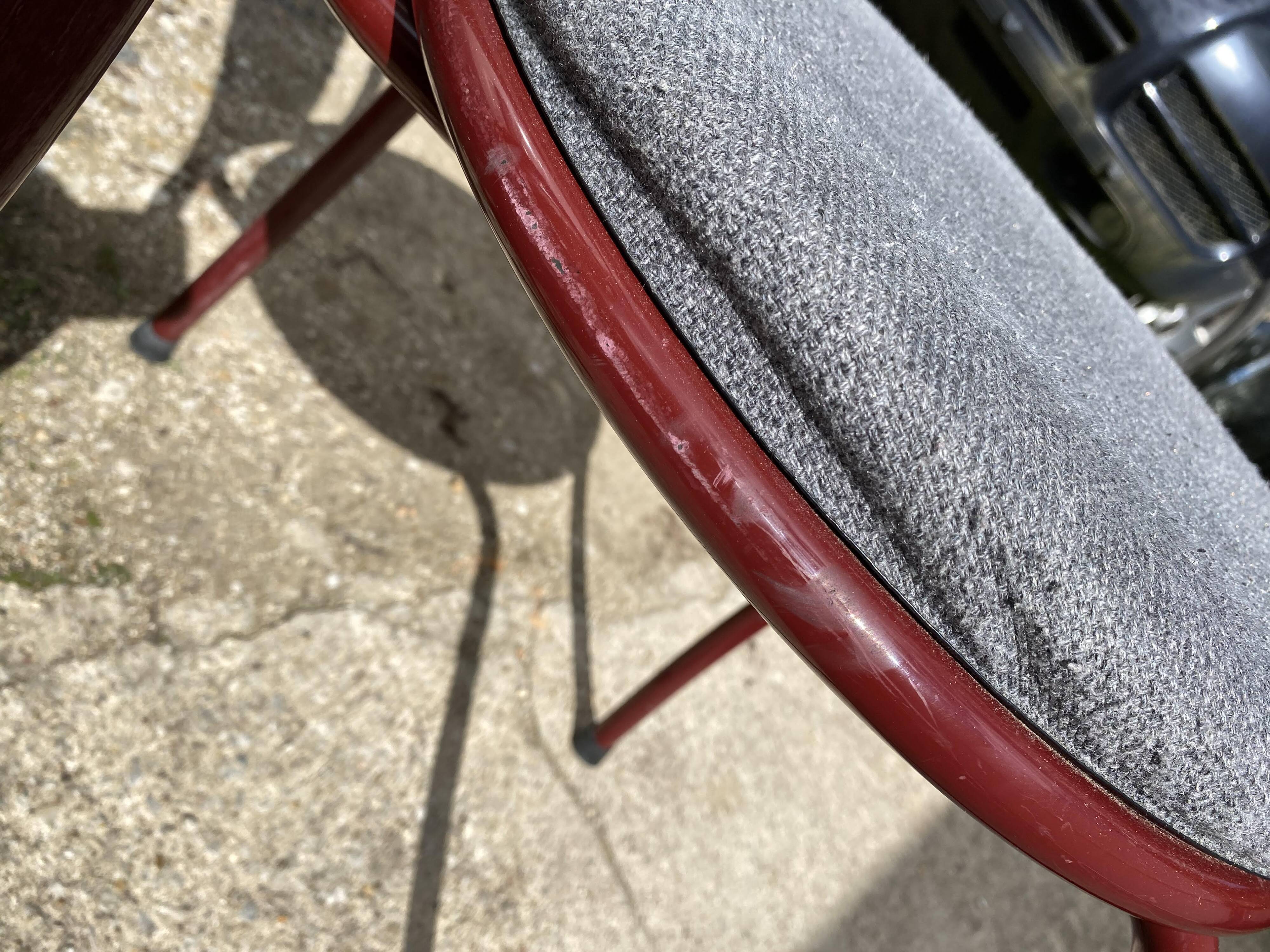 Metallic burgundy bistro chair for restaurants and communities with gray fabric