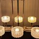 Eight-light chandelier in gilded brass and blue, 1950.