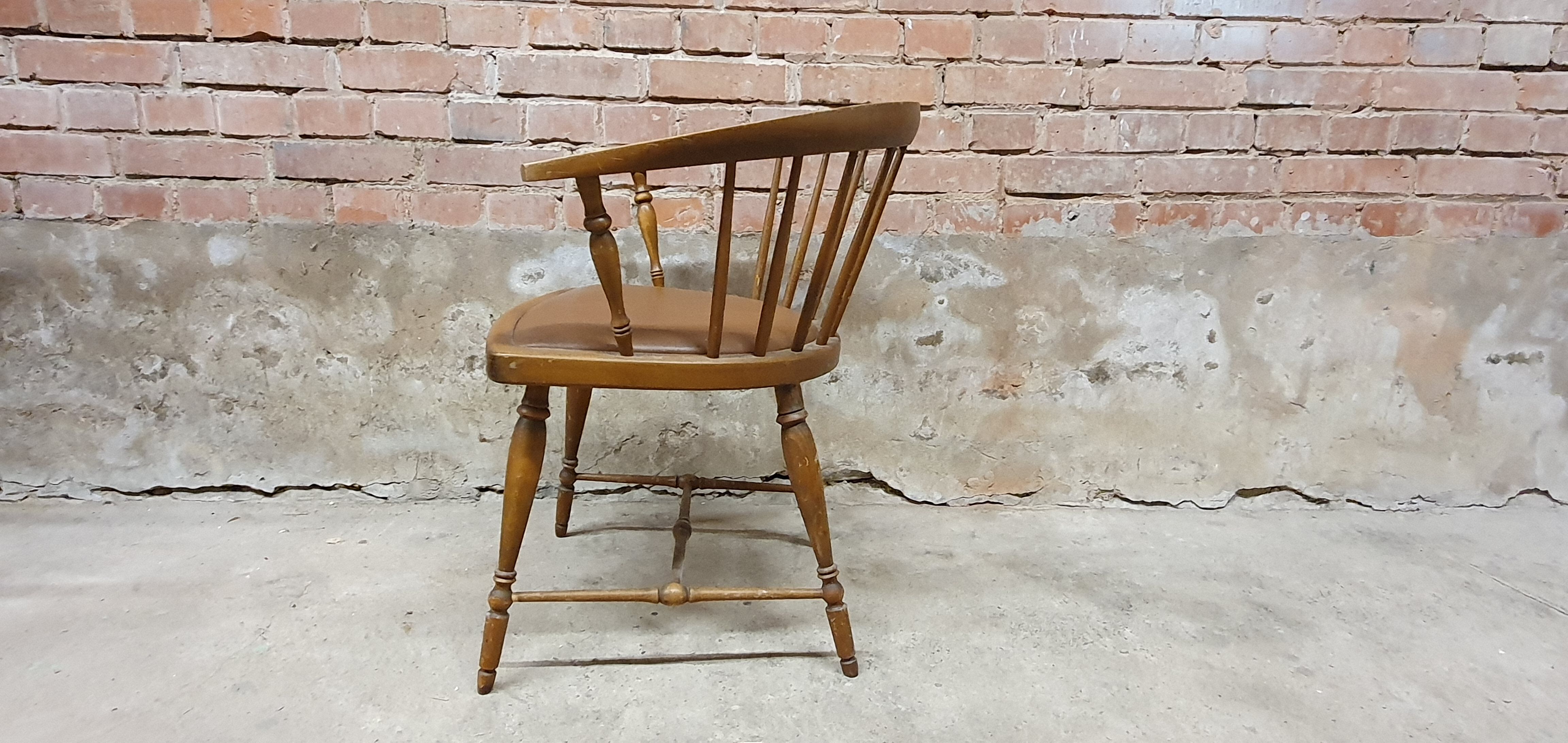 Vintage office armchair with Scandinavian style bar