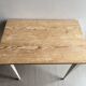 Table en bois patiné blanche