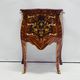 Marquetry chest of drawers with inlay in Louis XV style