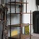 Napoleon III spool shelf, floor-standing shelf with brass tips.