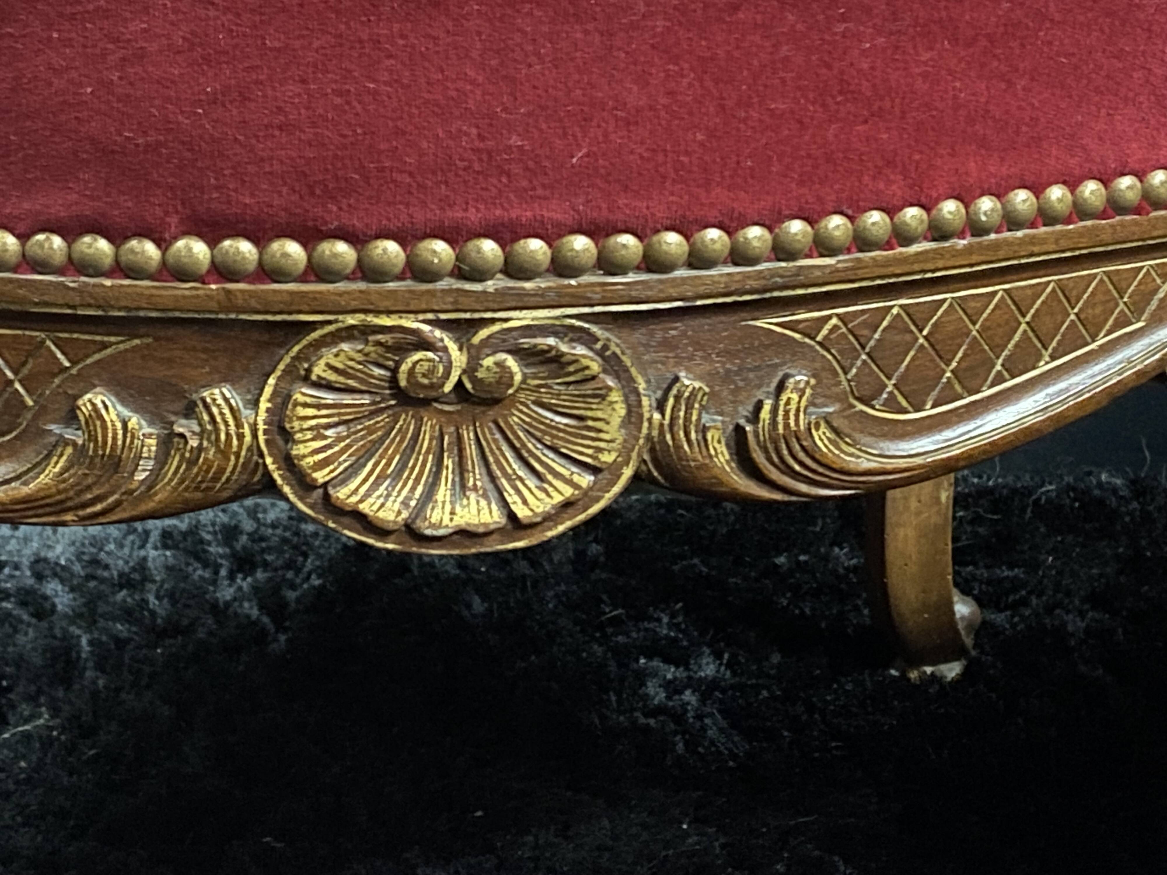 Pair of flat-back armchairs in Louis XV style in red velvet.