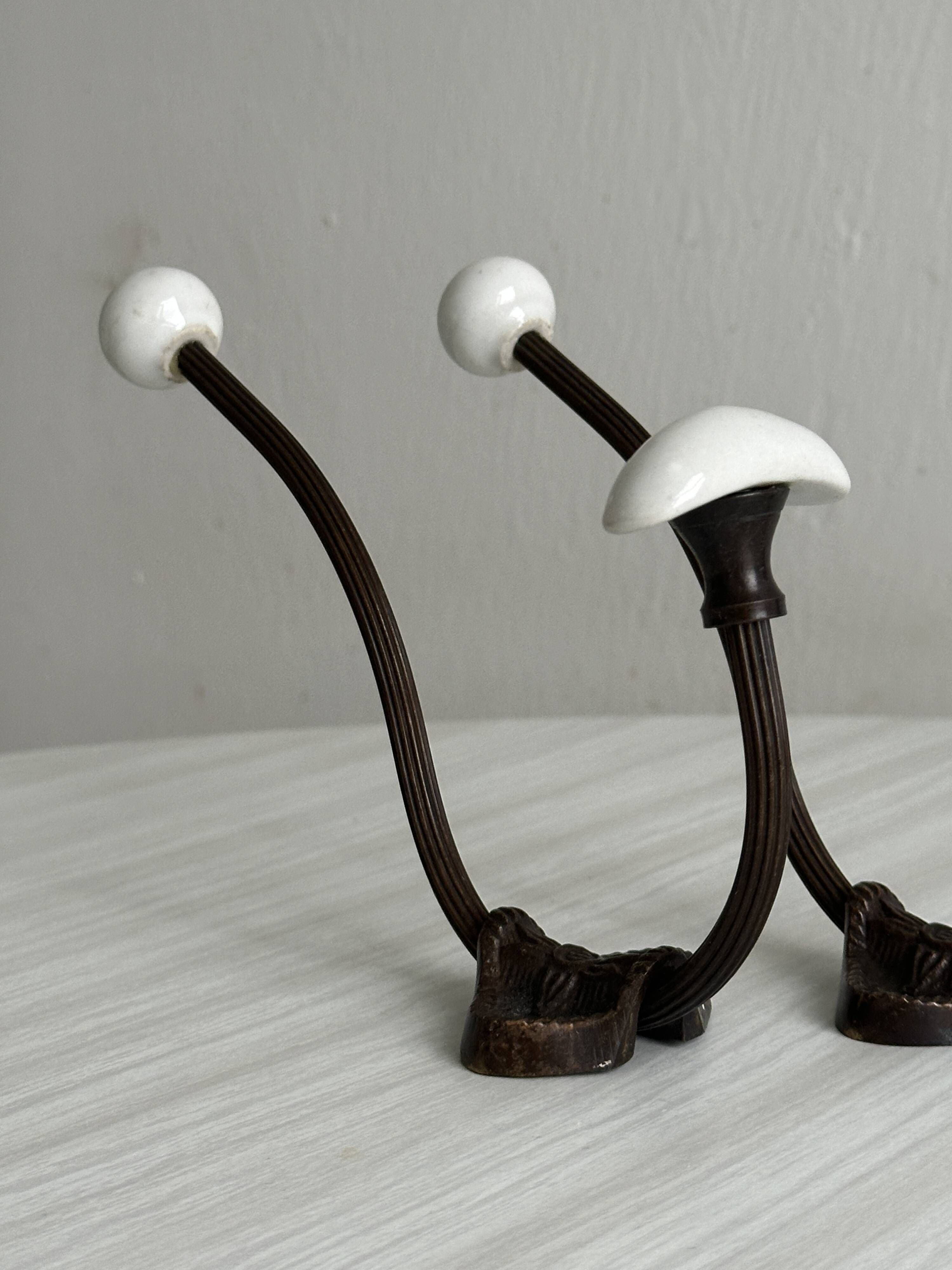 set of 2 metal and porcelain ceramic hooks