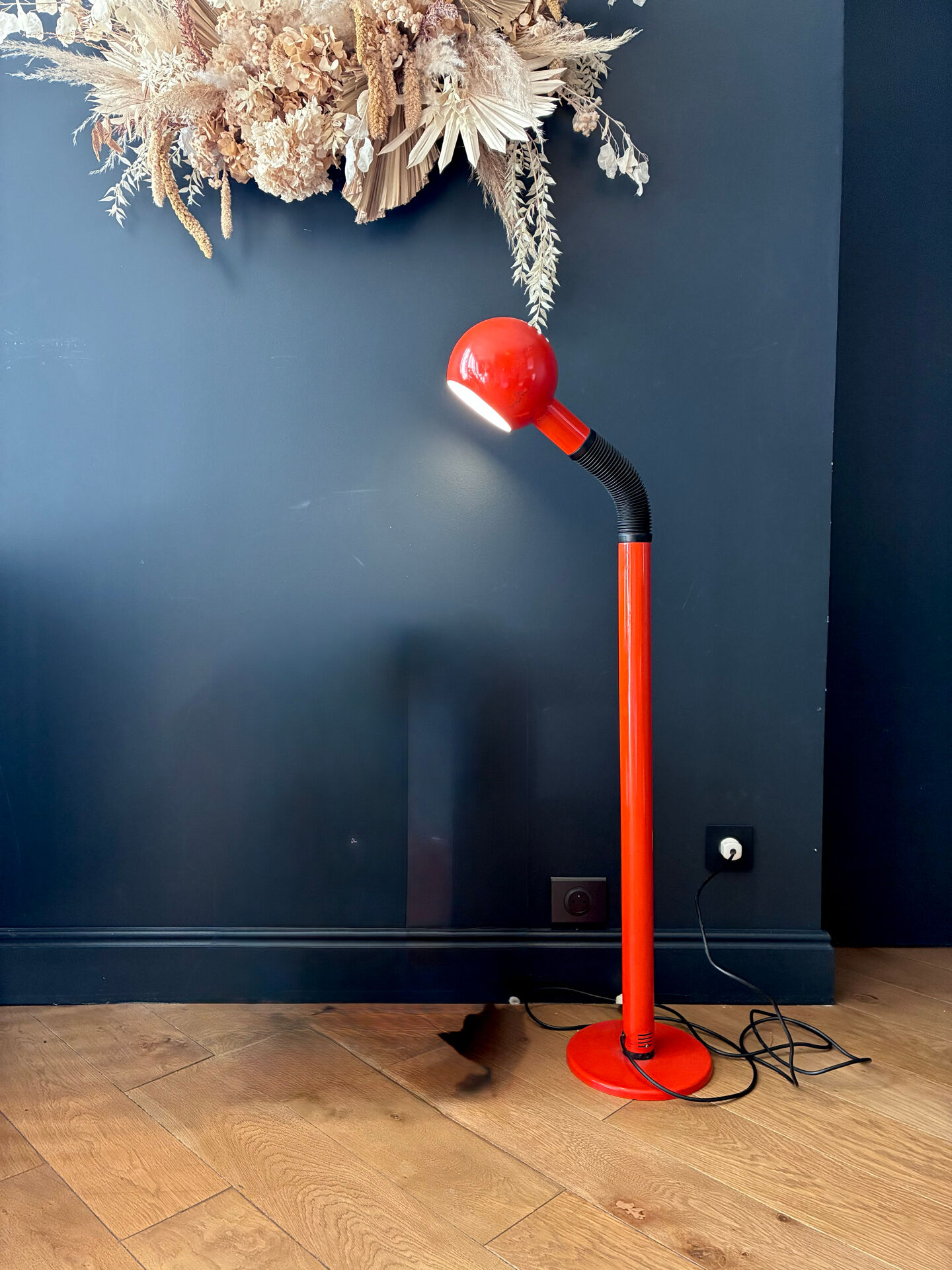 1970s orange lacquered metal floor lamp.
