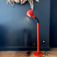 1970s orange lacquered metal floor lamp.