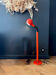 1970s orange lacquered metal floor lamp.
