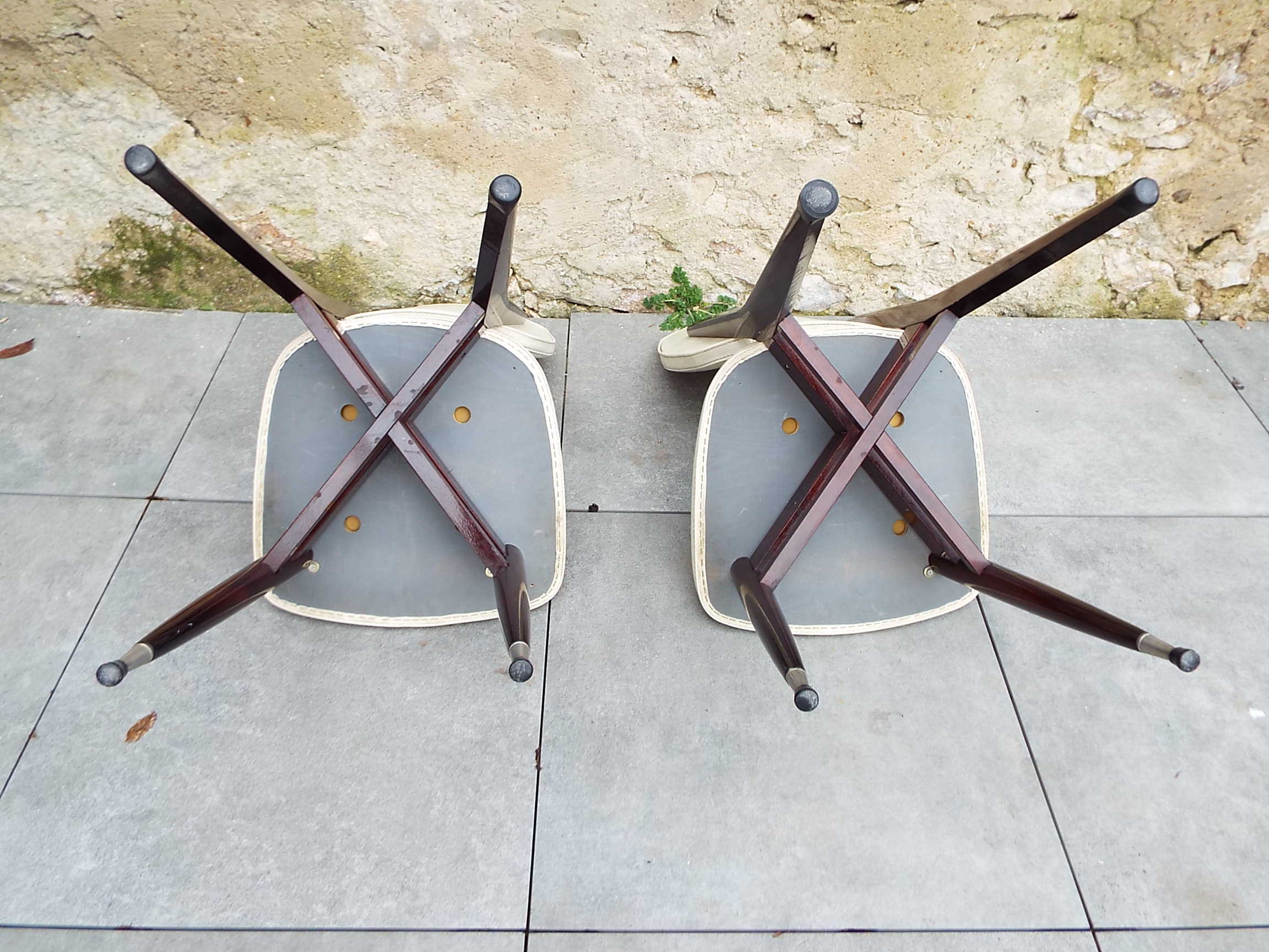 2 skai and wooden chairs