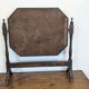 Antique beveled octagonal vanity mirror in carved wood