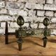 Pair of bronze andirons stamped bouhon frères in louis xvi style
