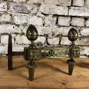 Pair of bronze andirons stamped bouhon frères in louis xvi style