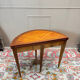 Half-moon game table in marquetry from the Louis XVI period, 18th century.