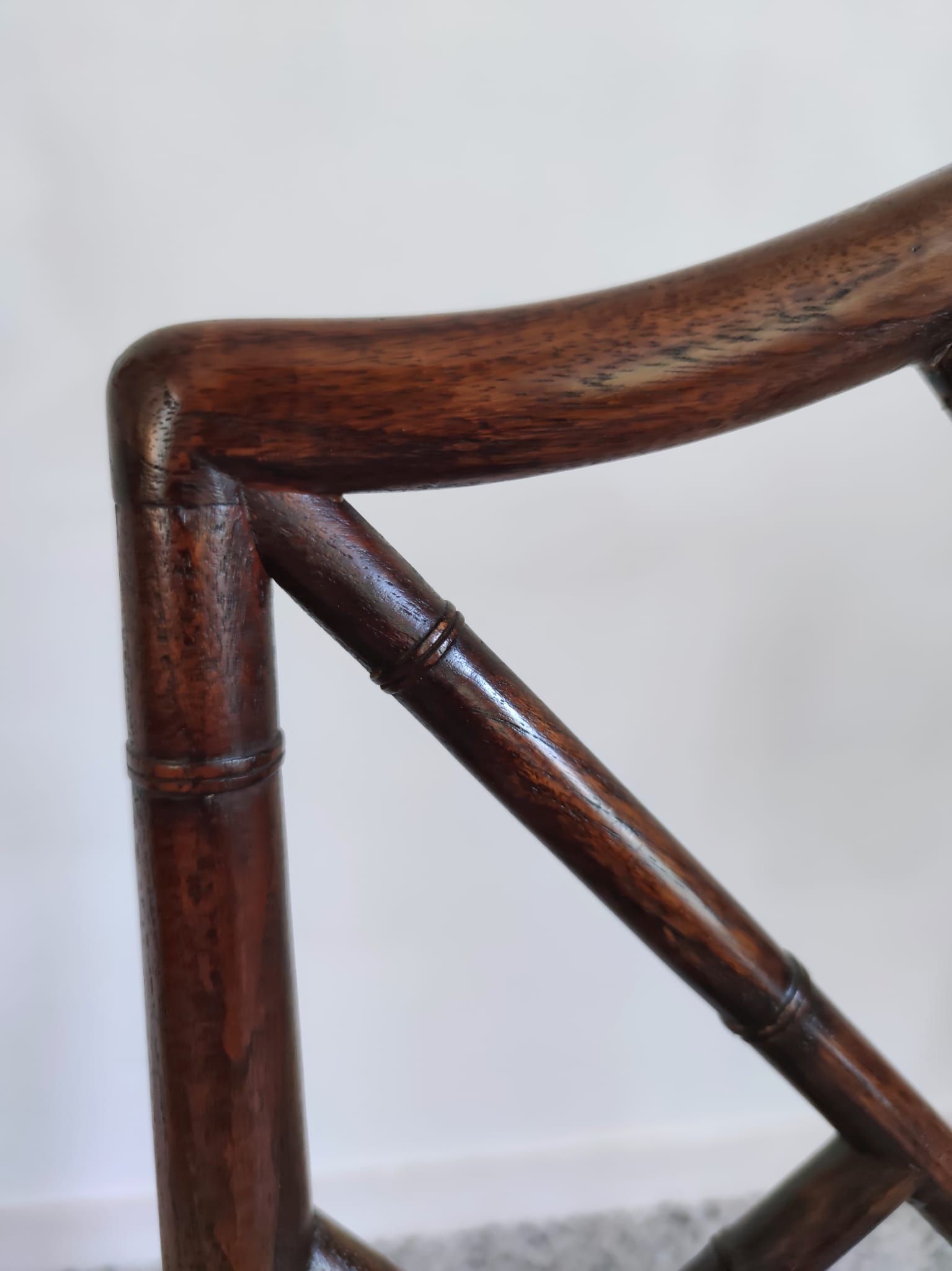 Asian canine armchair in wood in imitation of bamboo