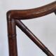Fauteuil asiatique canné en bois à l'imitation du bambou