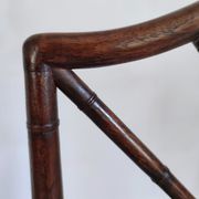 Asian canine armchair in wood in imitation of bamboo