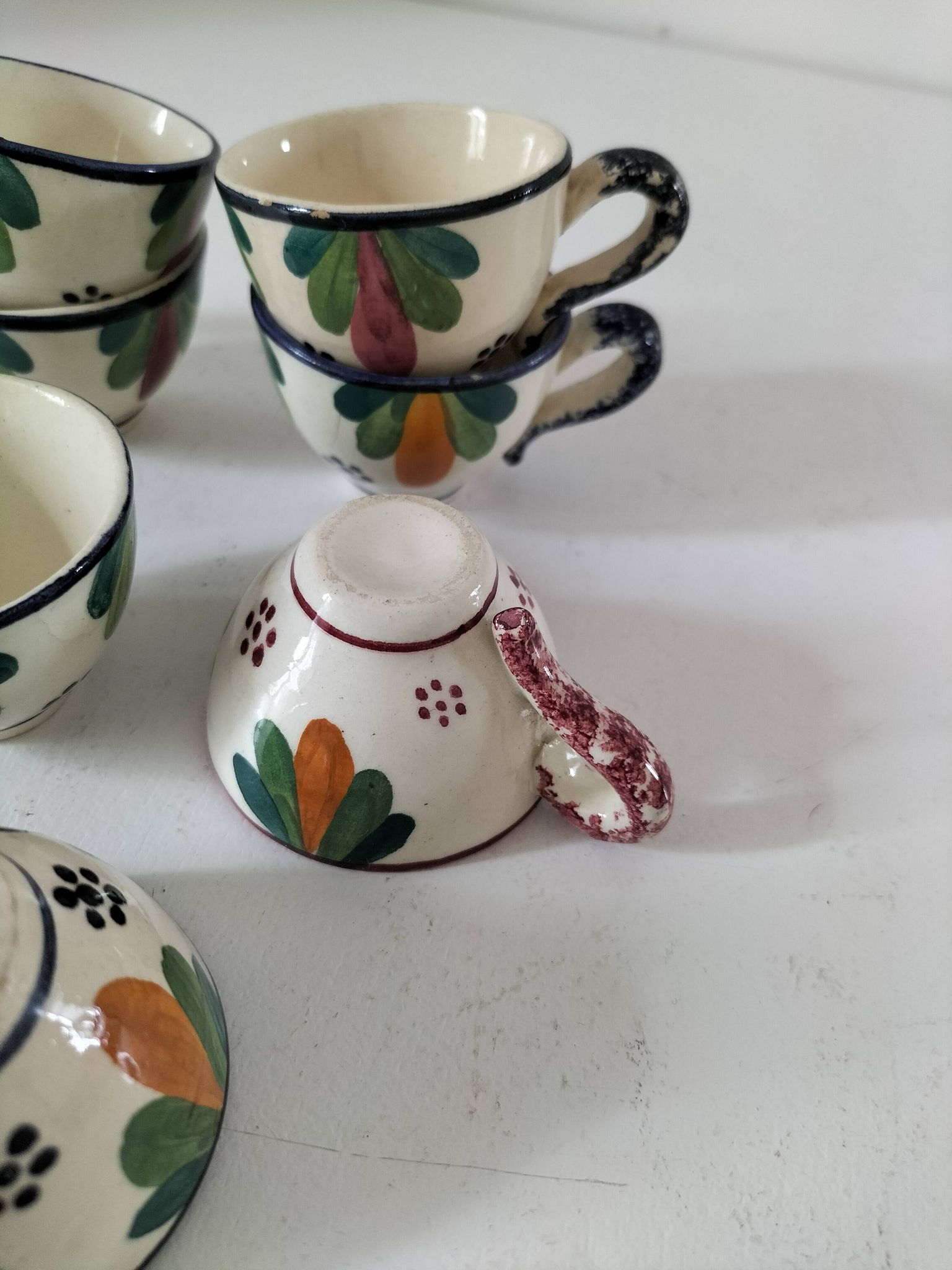Set of 7 miniature Quimper earthenware cups