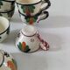 Set of 7 miniature Quimper earthenware cups