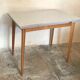 Vintage table 1960's wood and formica with extensions and wooden legs