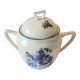 Vintage sugar bowl with blue and white floral pattern ceramic.