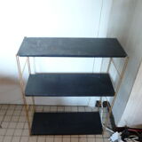 String shelf in gold and black metal