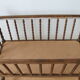 Old Vintage cradle with balance on wheels