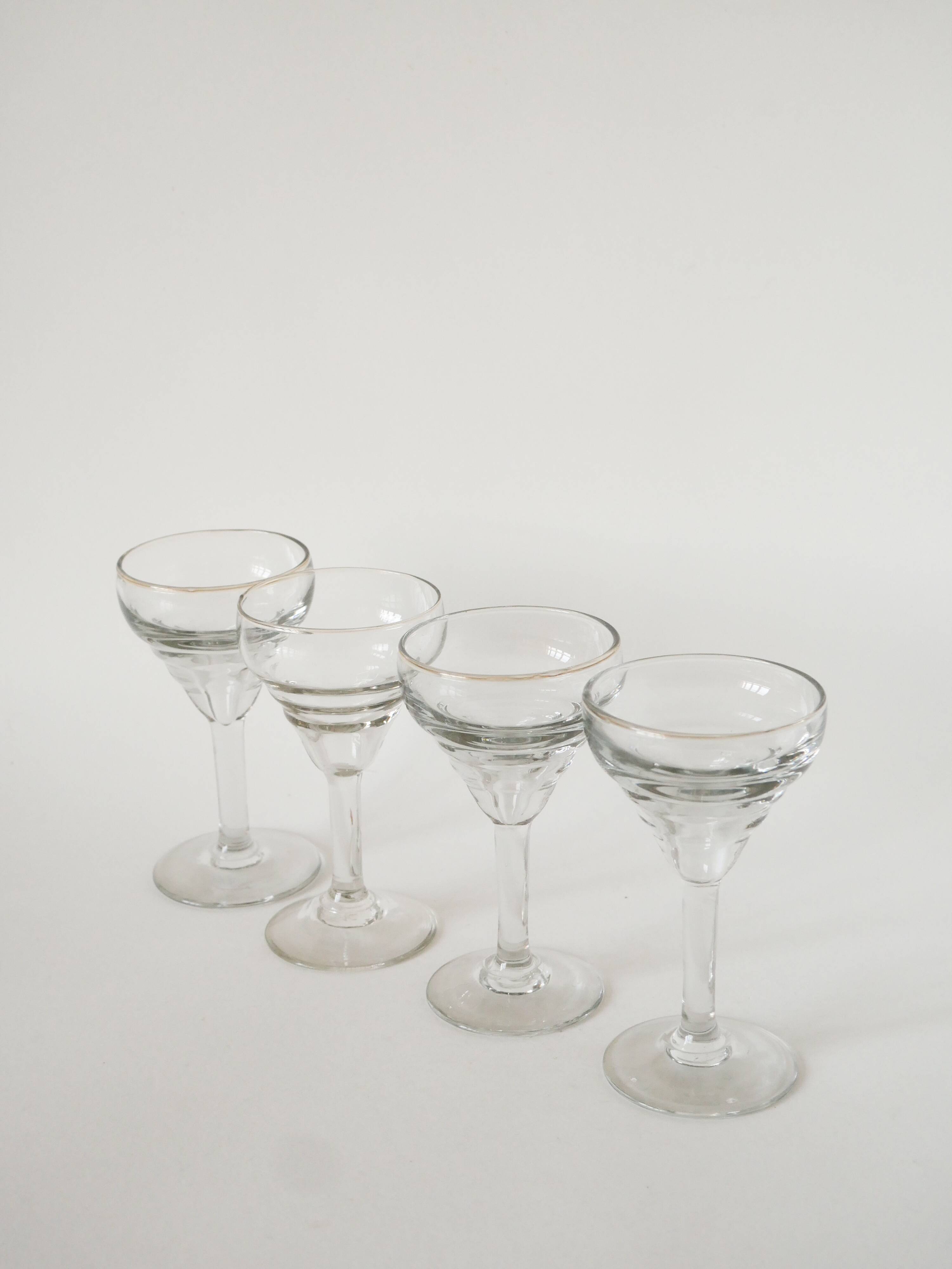 Set of 4 moulded glass wine glasses, 1920