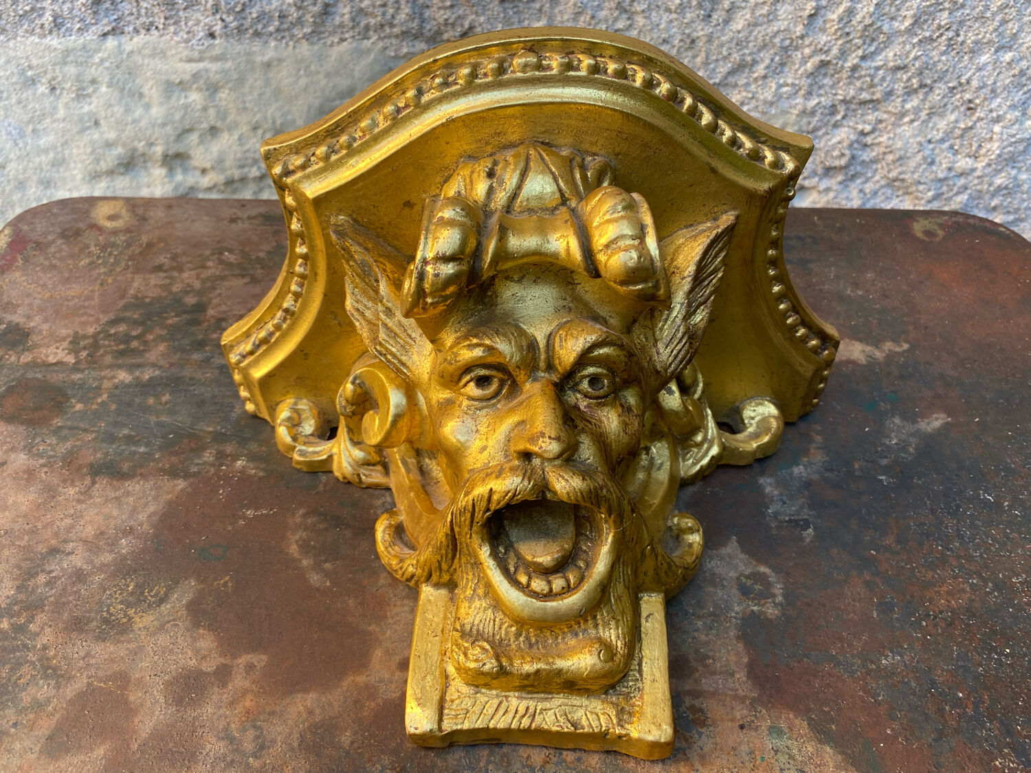 Devil's head wall console