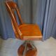 Swivel American chair in walnut and cast iron