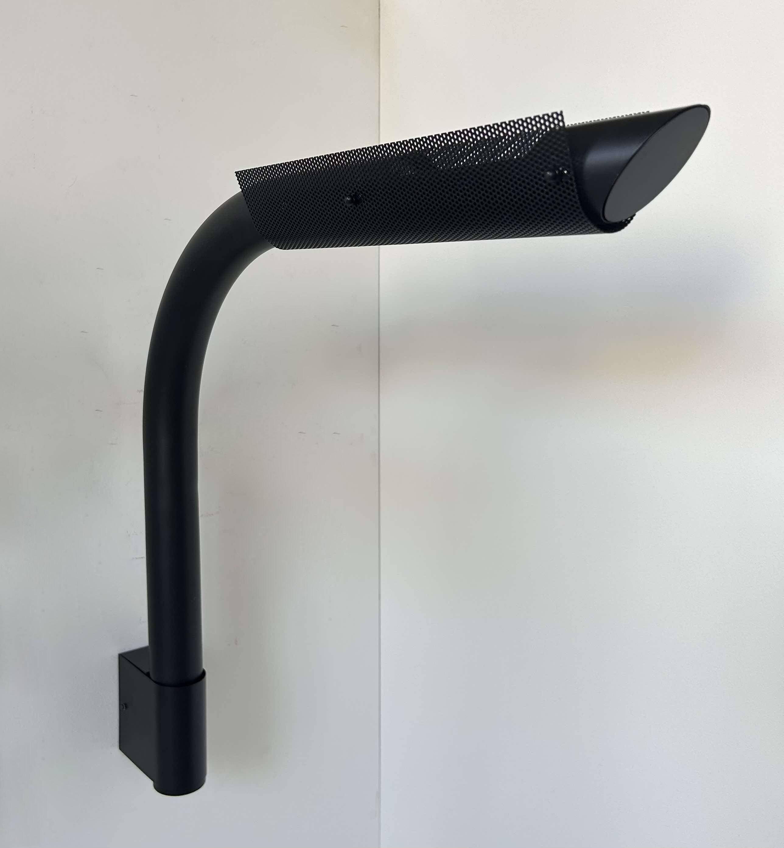 Pair of vintage wall lights, tubular and perforated black metal, Parscot France 1980