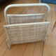 Vintage magazine rack in woven rattan and bamboo.