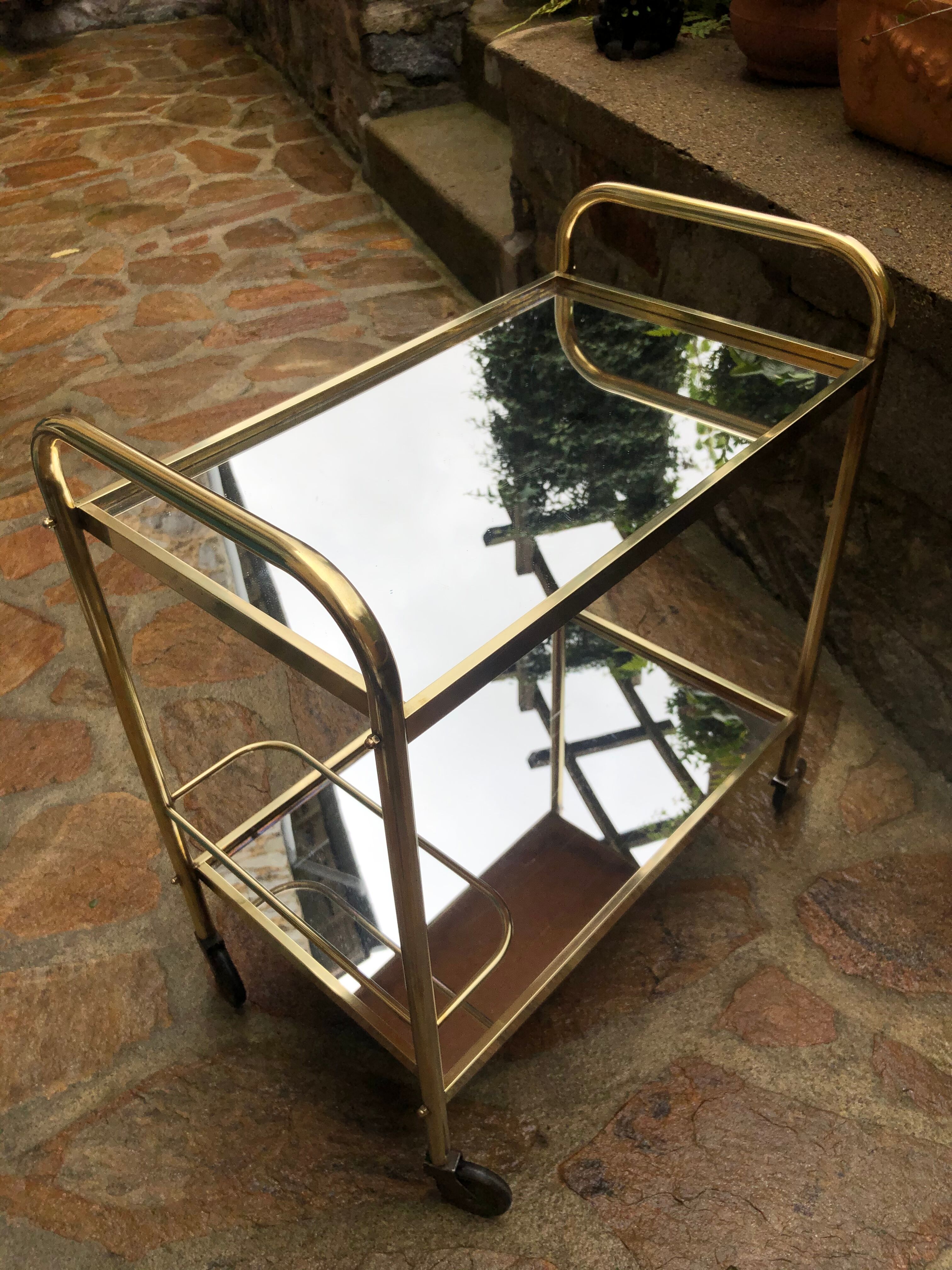 Golden rolling desserte vintage mirror trays