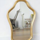 Golden mirror in wood and gold leaf