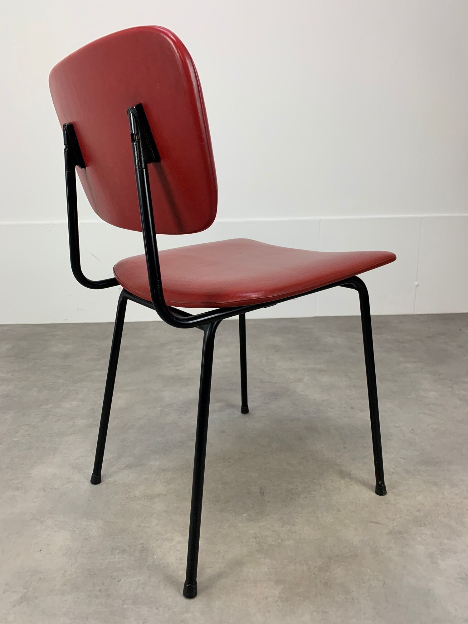 Airborne chair model Carolina Prefacto, 1950, metal and red skaï