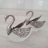 Two frosted glass swan salt cellars with silver plating.