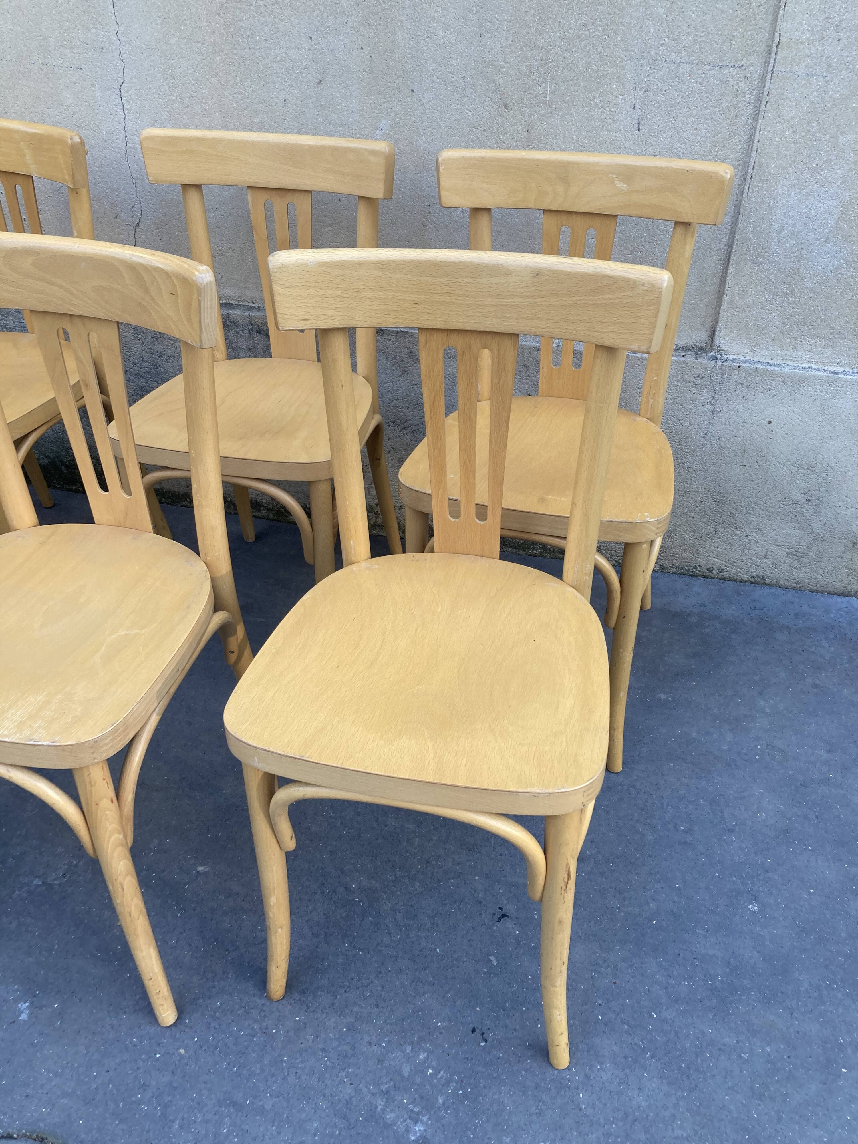 Set of 10 bistro chairs in light beech.