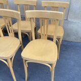 Set of 10 bistro chairs in light beech.