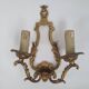 Pair of antique candlestick wall sconces