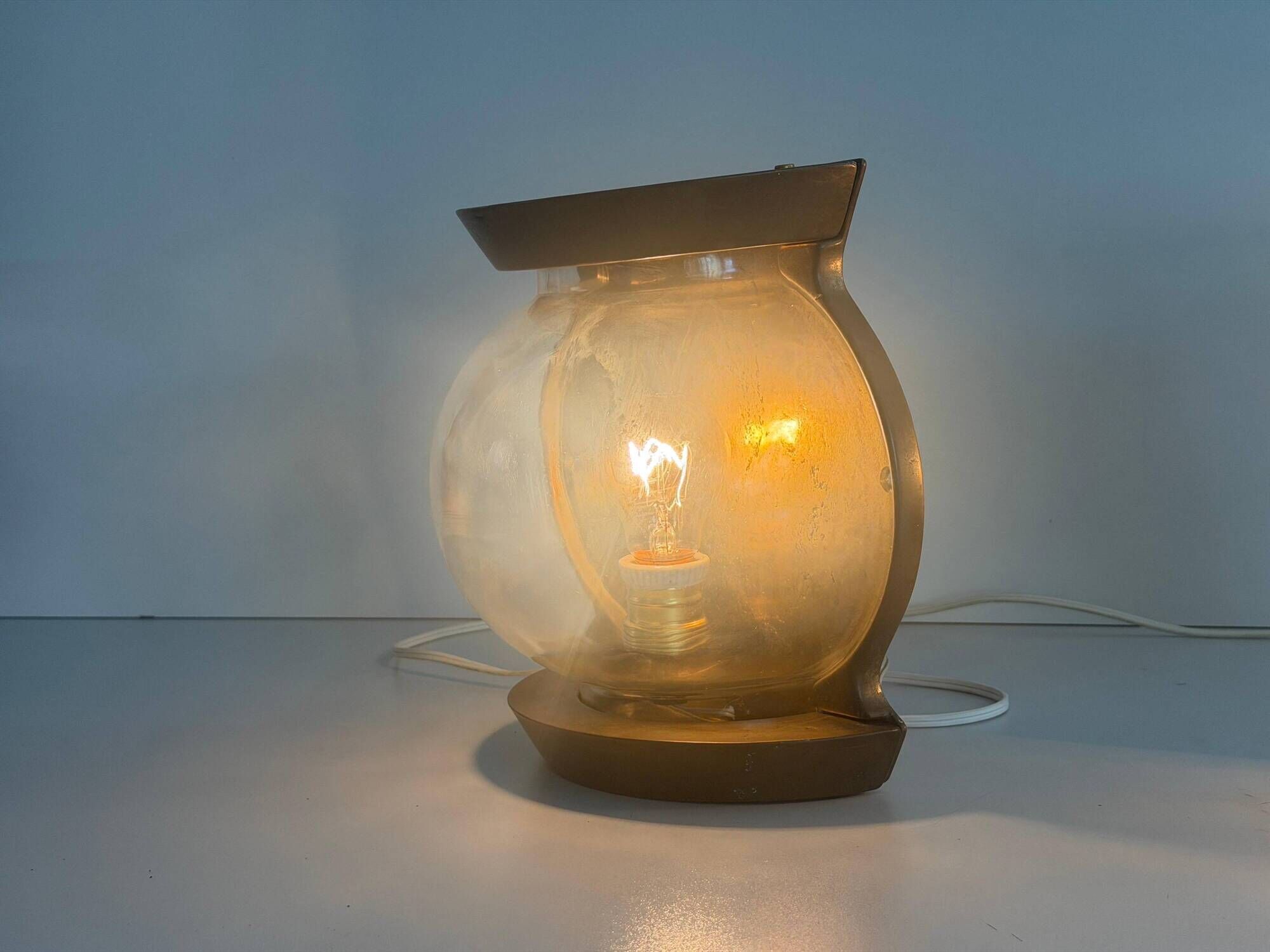 Pair of bronze and glass wall lights from the mid-century, 1960, Italy.