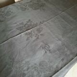 Old damask tablecloth with monogram