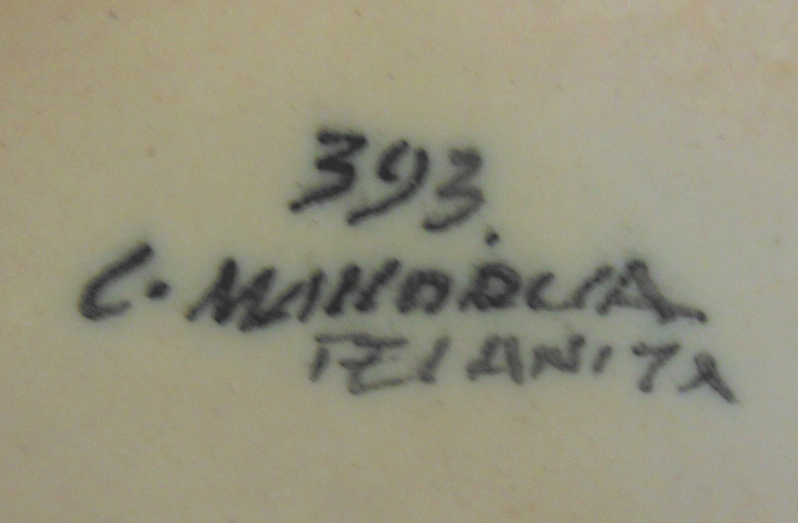 Ceramic vase with signature