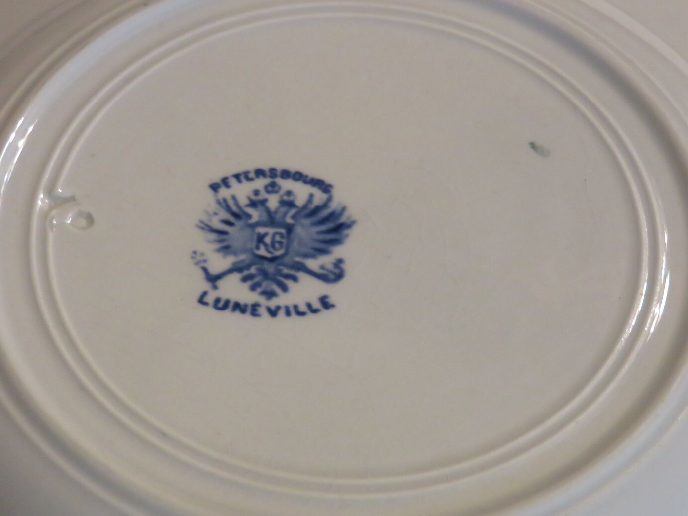 Suite 4 assiettes terre de fer Luneville