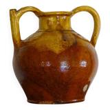 Pichet ou orjol ancien en faïence française à glaçure jaune