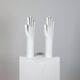 Pair of authentic vintage jewellery displays in industrial porcelain representing hands.