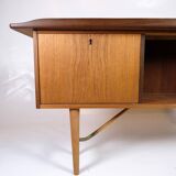 Bureau Bommerang fabriqué en teck et en laiton par Peter Løvig Nielsen pour Hedensted Furniture des années 1960