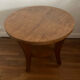 Low round art deco table in honey wood