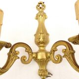 Pair of sconces in gilded bronze double candles