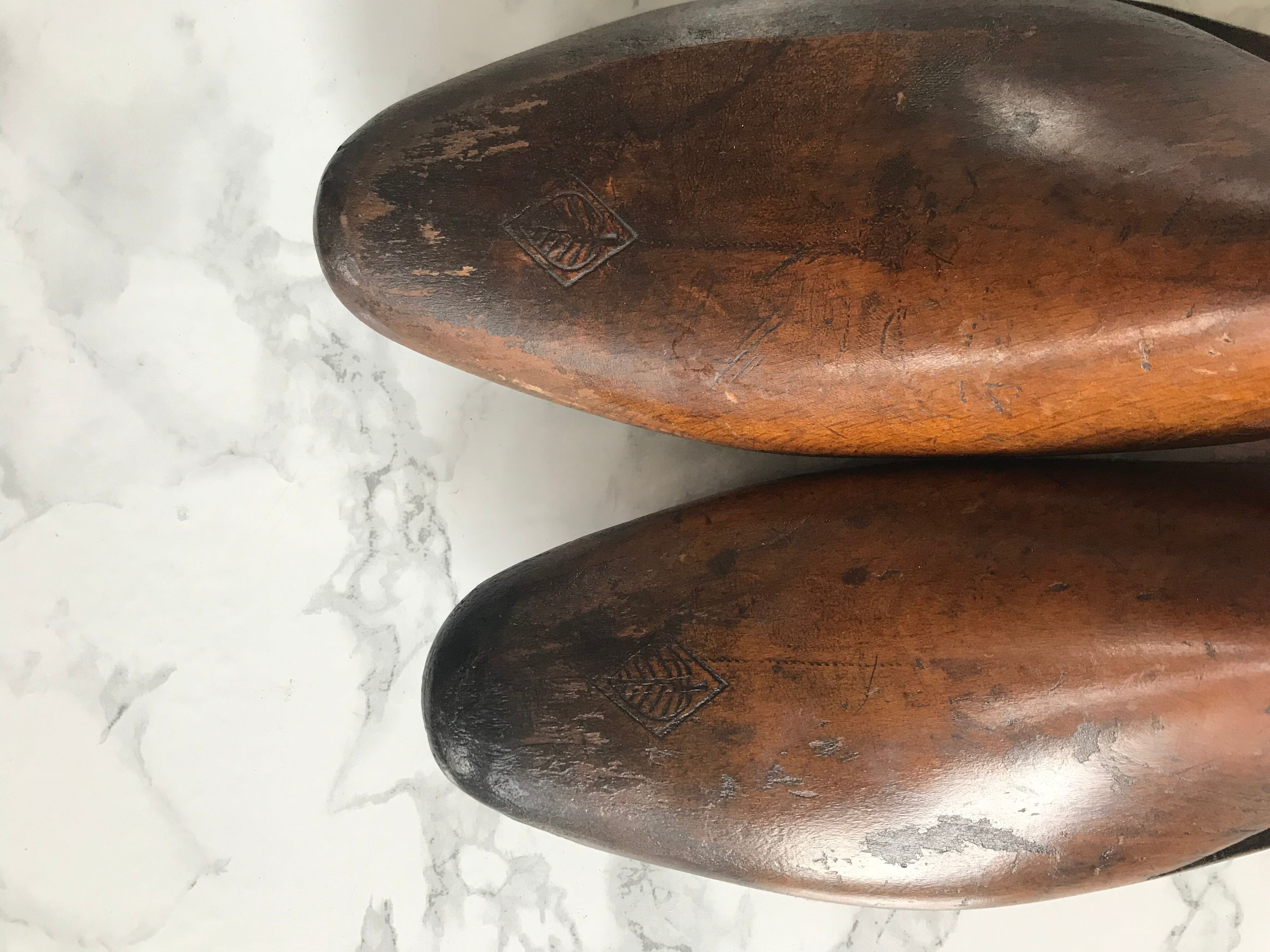 Pair of old solid wood shoes