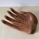 Wooden hand-held pocket emptier